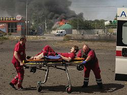 Paramedics Take An Injured Colleague To The Ambulance After Twin Russian Bombings In Kharkiv Ukraine Sunday Sept 1 2024