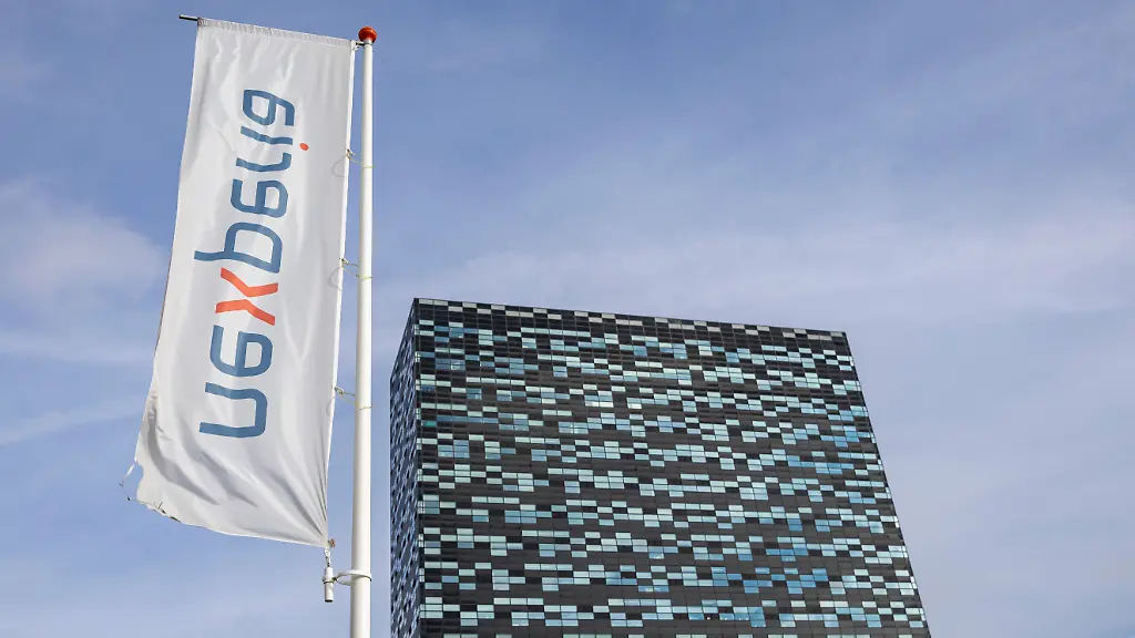 Close-up-view-with-banners-and-flags-with-Nexperia-logo-outside-of-Nexperia-headquarters-in-52Nijmegen-high-rise-building-in-Noviotech-Campus-housing-the-Nexperia-Holding-BV-HQ-Nexperia-is-a-semiconductor-chipmaker-manufacturer-a-tech-company-subsidiary-of-Wingtech-Technology-a-Shanghai-listed-company-partially-owned-by-the-Chinese-government-As-of-October-2025-the-Dutch-government-took-control-of-governance-of-the-firm-citing-security-concerns-while-triggering-worries-about-the-global-chip-supply-chain-and-disruption-in-the-automotive-industry