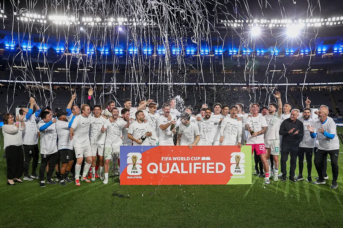 New-Zealand-s-team-celebrate-after-their-victory-during-the-FIFA-World-Cup-2026-Oceania-qualifiers-group-final-football-match-between-New-Zealand-and-New-Caledonia-at-Eden-Park-Stadium-in-Auckland-on-March-24-2025