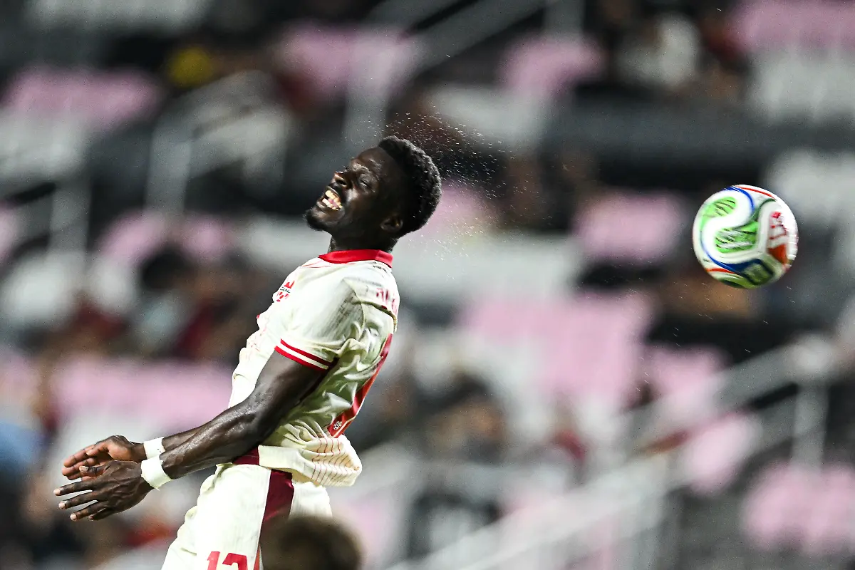 Canada-s-forward-12-Tanitoluwa-Oluwaseyi-jumps-for-the-ball-during-the-international-friendly-football-match-between-Canada-and-Venezuela-at-Chase-Stadium-in-Fort-Lauderdale-Florida-on-November-18-2025
