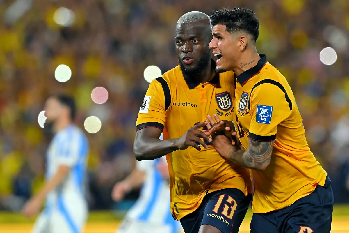 Ecuador-s-forward-13-Enner-Valencia-L-celebrates-with-teammate-defender-03-Piero-Hincapie-R-after-scoring-his-team-s-first-goal-during-the-2026-FIFA-World-Cup-South-American-qualifiers-football-match-between-Ecuador-and-Argentina-at-the-Monumental-Banco-Pichincha-Stadium-in-Guayaquil-Ecuador-on-September-9-2025