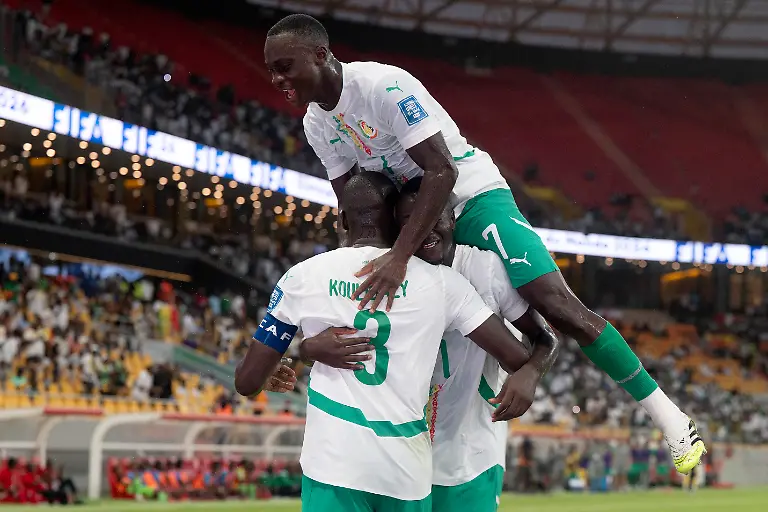 Senegal-s-defender-03-Kalidou-Koulibaly-celebrates-after-scoring-the-team-s-first-goal-during-the-FIFA-World-Cup-2026-Group-B-African-qualification-football-match-between-Senegal-and-Sudan-at-the-Maitre-Abdoulaye-Wade-Stadium-in-Diamniadio-on-September-5-2025