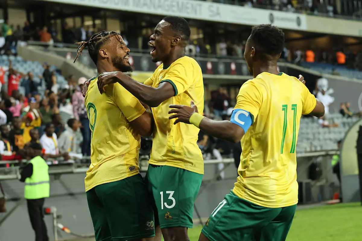 South-Africa-s-forward-9-Lyle-Foster-L-celebrates-with-teammates-after-scoring-a-goal-during-the-2025-CAF-Africa-Cup-of-Nations-CAN-Group-K-qualifying-match-between-South-Africa-and-Uganda-at-the-Orlando-Stadium-in-Soweto-on-September-6-2024