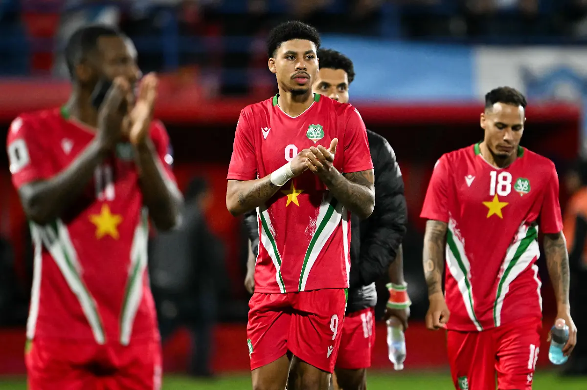 Suriname-players-react-after-the-2026-FIFA-World-Cup-Concacaf-qualifier-football-match-between-Guatemala-and-Suriname-at-the-Manuel-Felipe-Carrera-stadium-in-Guatemala-City-on-November-18-2025