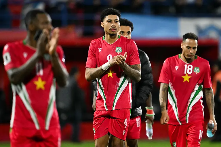 Suriname-players-react-after-the-2026-FIFA-World-Cup-Concacaf-qualifier-football-match-between-Guatemala-and-Suriname-at-the-Manuel-Felipe-Carrera-stadium-in-Guatemala-City-on-November-18-2025