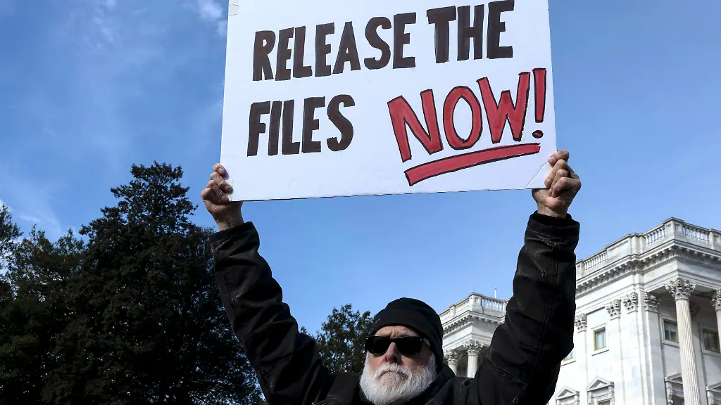 November-18-2025-Washington-District-Of-Columbia-USA-A-Protester-holds-a-sign-that-says-Release-The-Files-Now-during-a-news-conference-on-the-Epstein-Files-Transparency-Act-outside-the-U-S-Capitol-The-US-House-and-Senate-voted-overwhelmingly-to-make-the-justice-department-release-the-Epstein-files