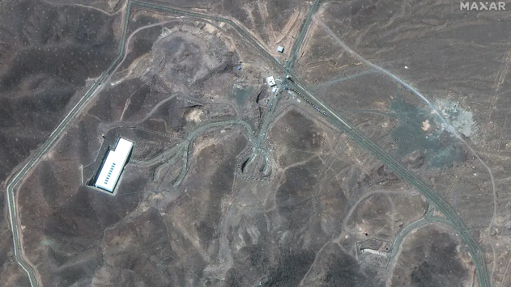This-satellite-image-provided-by-Maxar-Technologies-shows-vehicles-at-Fordo-enrichment-facility-in-Iran-on-Thursday-June-19-2025