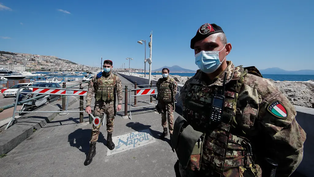 Italian-Army-soldiers-are-at-a-checkpoint-in-sea-front-in-Naples-city-The-Italian-government-has-closed-most-stores-to-stop-the-spread-of-the-COVID-19-coronavirus-epidemic