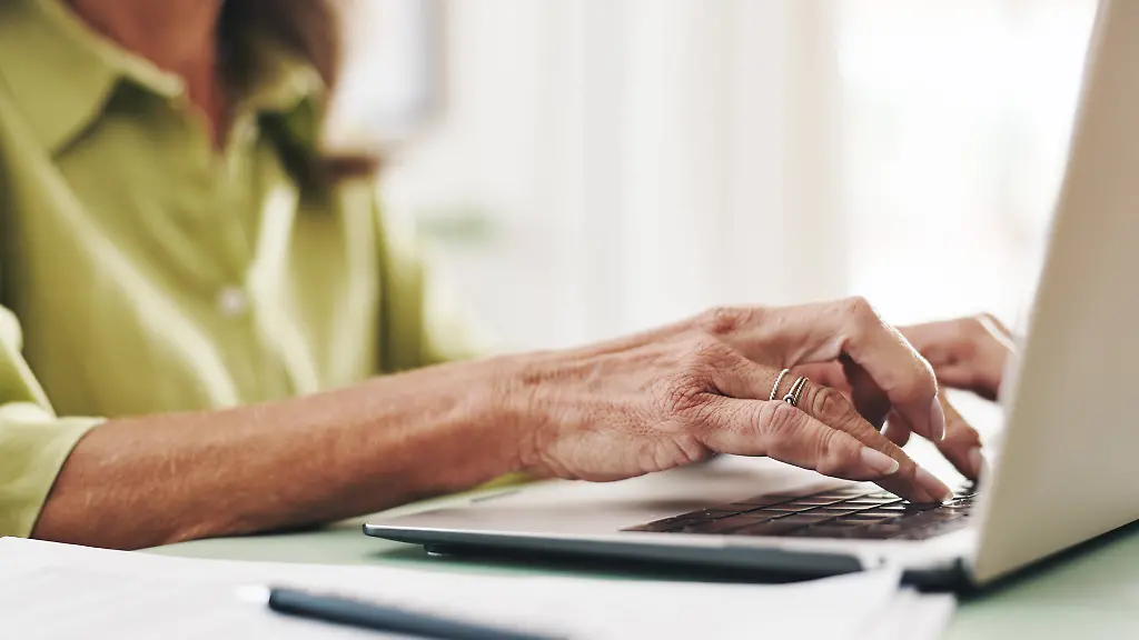 Typing-hands-and-laptop-with-older-woman-at-home-for-retirement-fund-retirement-savings-assets-and-budget-Research-planning-and-online-banking-with-closeup-senior-people-for-account-passwords Typing-and-lap-hands top-with-older-women-at-home-for-retirement-funds-retirement-savings-assets-and-budgets-research-planning-and-online-banking-with-closeup-senior-people-for-model-account-password-released-property-released-96798114