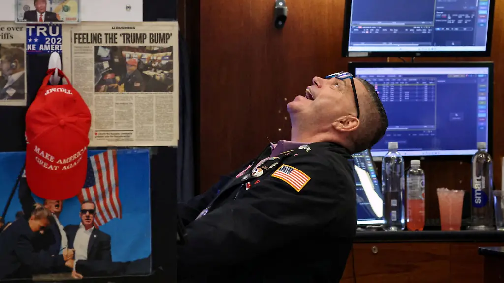 A-trader-works-on-the-floor-at-the-New-York-Stock-Exchange-NYSE-in-New-York-City-U-S-November-21-2025