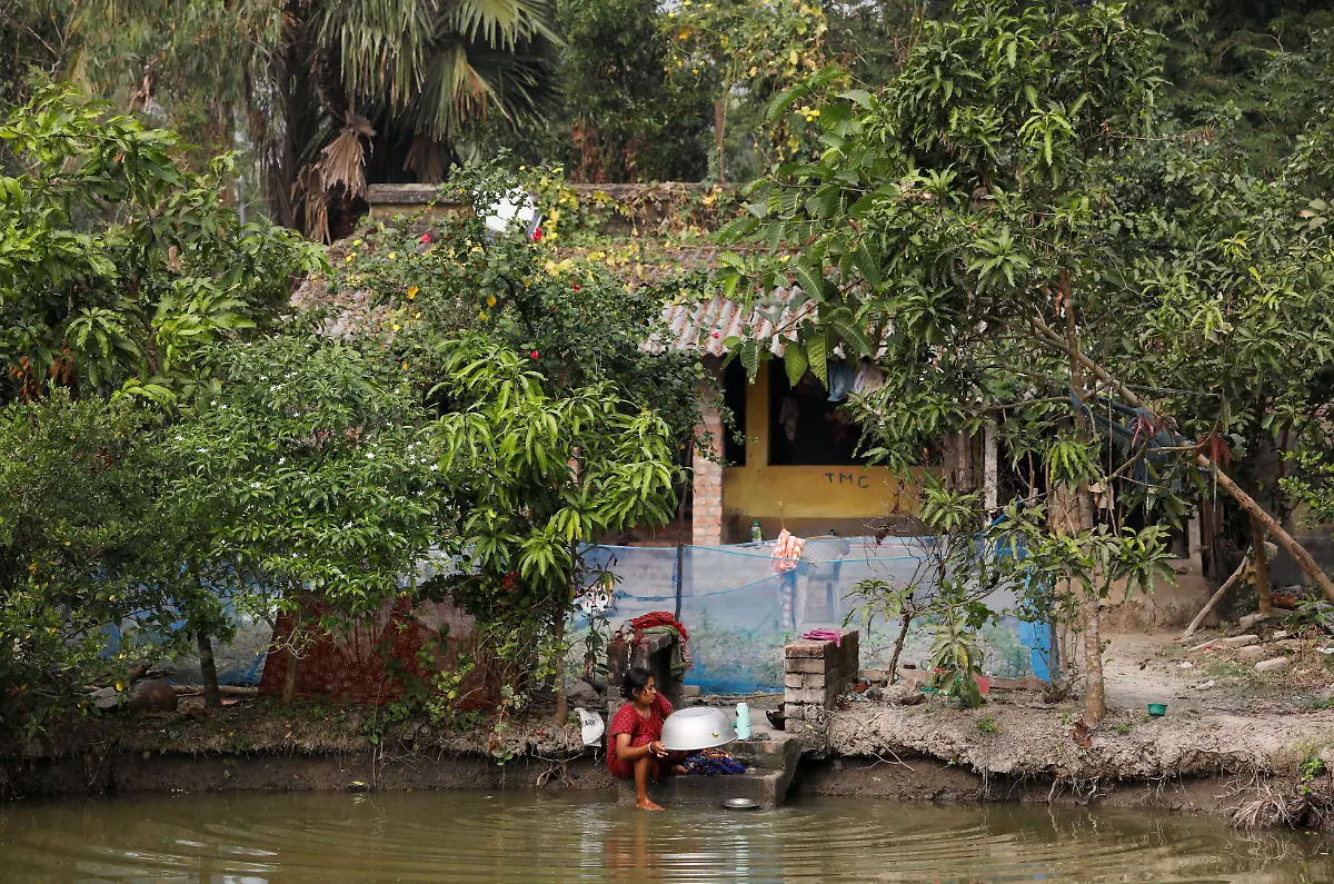 2021-01-13T230958Z-756147287-RC2B7L9HDFEP-RTRMADP-3-CLIMATE-CHANGE-INDIA-SUNDARBANS