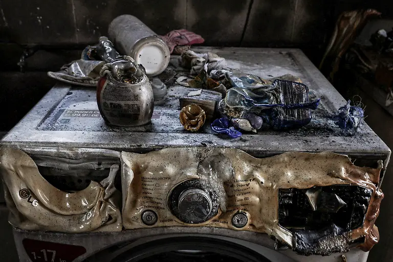Molten-laundry-products-belonging-to-Beatriz-Rey-47-sit-atop-a-charred-washing-machine-following-a-wildfire-the-day-before-in-Casarrubios-del-Monte-Spain-July-18-2025-Although-the-record-breaking-wildfires-that-ripped-across-Spain-and-Portugal-in-August-have-subsided-residents-in-rural-communities-in-Spain-s-northwestern-Galicia-region-are-still-battling-the-aftermath-What-happened-here-is-crazy-said-Cristina-Santin-a-biologist-from-northwestern-Spain-who-studies-fire-impacts-Suddenly-you-get-up-one-day-and-your-home-region-is-burning-on-a-scale-that-is-completely-unprecedented-REUTERS-Violeta-Santos-Moura-SEARCH-IBERIA-WILDFIRES-AFTERMATH-FOR-THIS-STORY-SEARCH-WIDER-IMAGE-FOR-ALL-STORIES