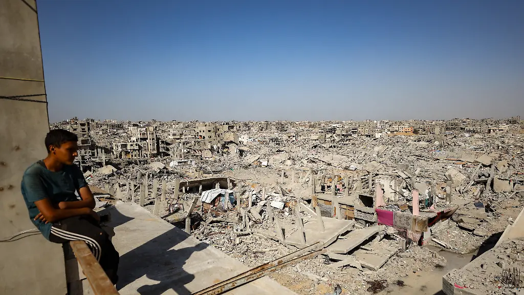 GAZA-CITY-GAZA-Aei-NOVEMBER-23-Palestinians-who-returned-to-the-Al-Zerka-area-of-the-Al-Tuffah-neighborhood-after-the-ceasefire-continue-to-live-amid-destroyed-buildings-and-makeshift-shelters-on-November-23-2025-Lacking-basic-necessities-such-as-adequate-shelter-food-and-clean-water-families-struggle-to-survive-under-extremely-difficult-conditions-in-the-blockaded-Gaza-Strip