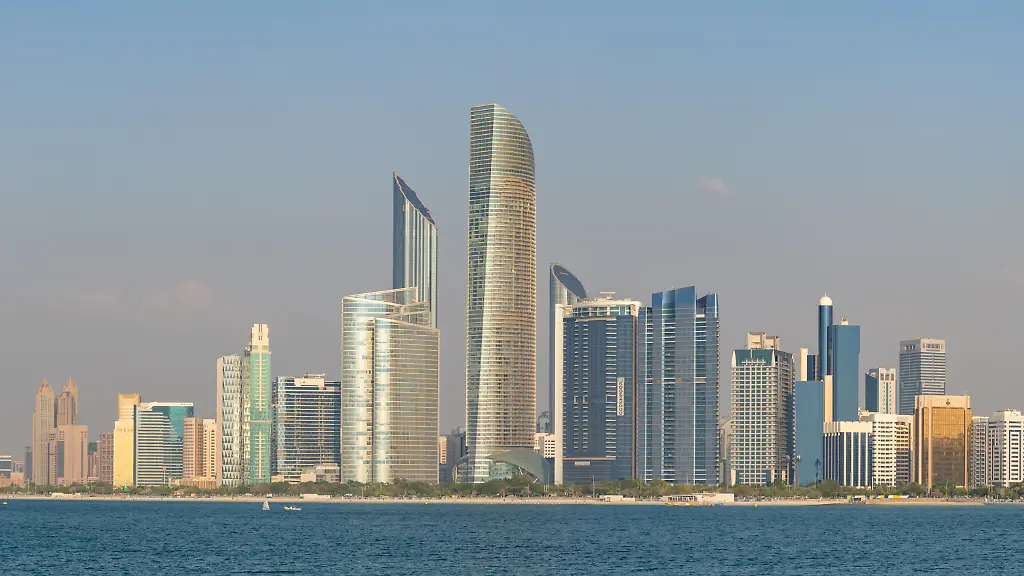 A-panorama-picture-of-the-Al-Markaziyah-West-buildings-towered-by-the-Landmark-Tower-as-seen-from-across-the-water