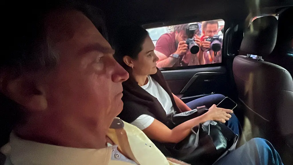 Former-Brazilian-President-Jair-Bolsonaro-accompanied-by-his-wife-Michele-leaves-DF-Star-Hospital-in-Brasilia-on-September-17-2025-Brazil-s-Jair-Bolsonaro-has-been-diagnosed-with-skin-cancer-his-doctor-said-on-September-17-2025-after-the-former-president-was-discharged-from-an-overnight-stay-in-hospital-for-separate-medical-woes