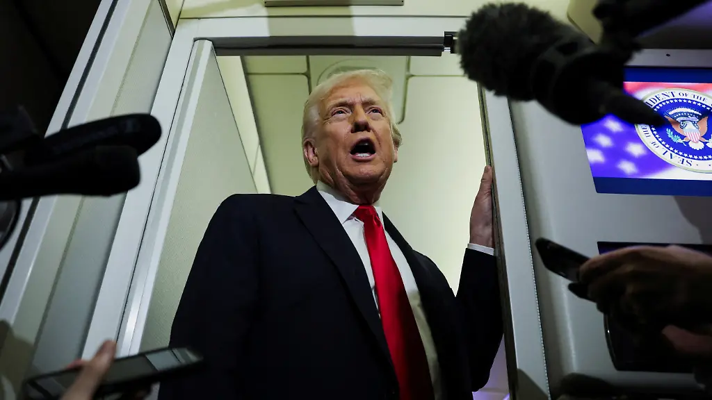 FILE-PHOTO-U-S-President-Donald-Trump-speaks-to-reporters-aboard-Air-Force-One-during-travel-to-Palm-Beach-Florida-from-Joint-Base-Andrews-Maryland-U-S-November-25-2025