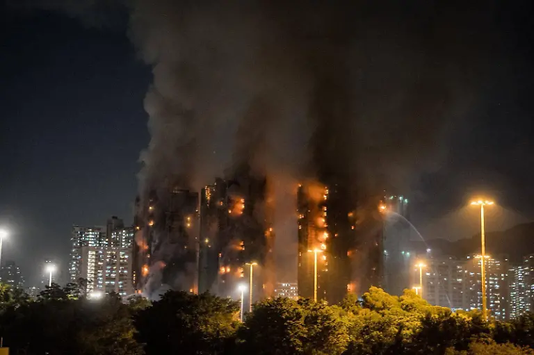 Fire-at-Hong-Kong-housing-estate-kills-at-least-4-injures-3-HONG-KONG-NOV-26-2025-Smoke-rises-after-major-fire-broke-out-at-a-housing-estate-in-Hong-Kong-on-November-26-2025-At-least-four-people-including-a-firefighter-died-while-three-others-were-injured-Stringer-Anadolu-Hong-Kong-China-Editorial-use-only-Please-get-in-touch-for-any-other-usage