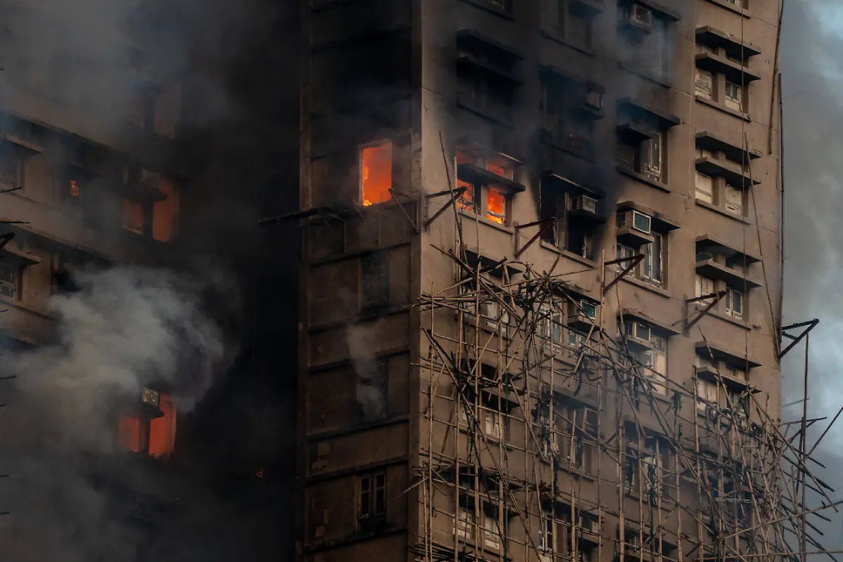 Hong-Kong-Building-Fire-A-burning-apartment-Smoke-and-flames-rise-as-a-major-fire-engulfs-several-residential-buildings-at-Wang-Fuk-Court-on-November-26-2025-in-Hong-Kong-Serval-residential-building-in-Wang-Fuk-Court-located-in-Tai-Po-District-caught-fire-today-the-Hong-Kong-Fire-Department-has-issued-the-No-5-fire-alarm-the-fire-at-local-time-1800-has-claimed-the-life-of-one-firefighter-and-three-other-people