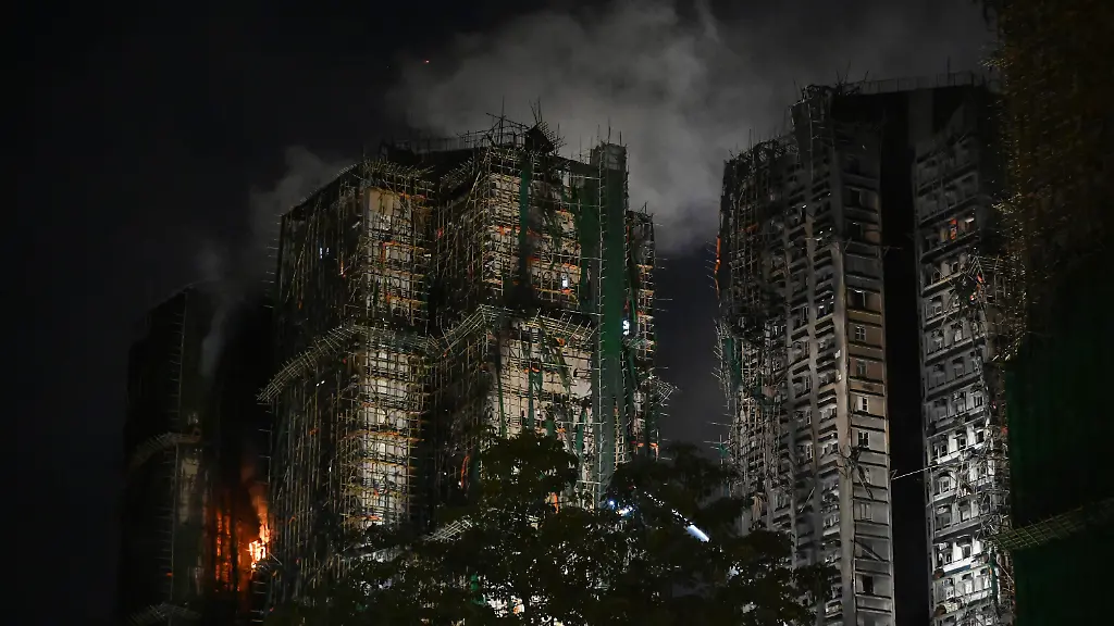 Apartment-Blocks-where-a-major-fire-engulfs-several-residential-buildings-at-Wang-Fuk-Court-on-November-27-2025-in-Hong-Kong-Serval-residential-building-in-Wang-Fuk-Court-located-in-Tai-Po-District-caught-fire-today-the-Hong-Kong-Fire-Department-has-issued-the-No-5-fire-alarm-the-fire-at-local-time-2200-75-Dead