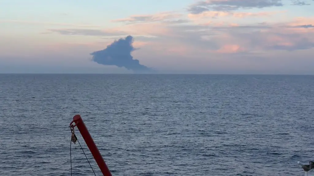 AT-BLACK-SEA-NOVEMBER-28-EDITORIAL-USE-ONLY-MANDATORY-CREDIT-TURKISH-DIRECTORATE-GENERAL-FOR-MARITIME-AFFAIRS-HANDOUT-NO-MARKETING-NO-ADVERTISING-CAMPAIGNS-DISTRIBUTED-AS-A-SERVICE-TO-CLIENTS-Smoke-rises-after-a-fire-alert-was-received-on-board-of-the-empty-tanker-KAIROS-28-miles-off-the-Turkish-coast-en-route-to-RussiaAeos-Novorossiysk-Port-at-Black-Sea-on-November-28-2028-The-fire-is-believed-to-have-been-caused-by-an-external-factor-Rescue-units-were-dispatched-to-the-area-to-evacuate-the-25-crew-members-on-the-vessel