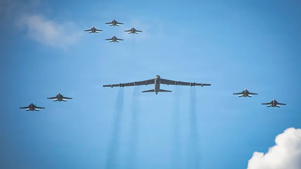November-13-2025-Mediterranean-Sea-International-Waters-U-S-Navy-F-A-18E-F-Super-Hornet-fighter-aircraft-escort-an-Air-Force-B-52-Stratofortress-bomber-during-operations-with-the-Ford-class-aircraft-carrier-USS-Gerald-R-Ford-November-13-2025-on-the-Caribbean-Sea-U-S-President-Trump-ordered-the-Ford-Carrier-Group-to-the-Caribbean-in-a-show-of-force-against-Venezuela-Credit-Image-A-Mc2-Daniel-Ruiz-U-S