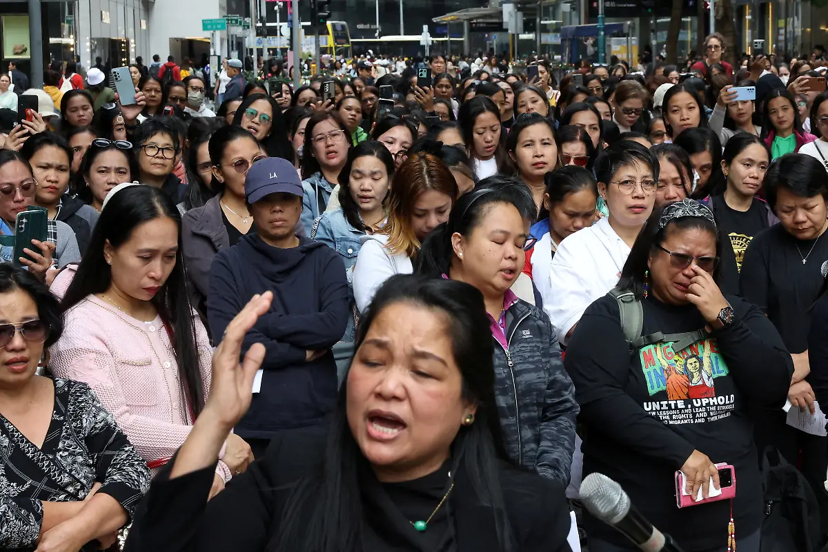 Mourners-attend-a-Filipino-community-prayer-meeting-for-victims-of-the-deadly-fire-that-occurred-on-Wednesday-at-the-Wang-Fuk-Court-housing-complex-in-Tai-Po-in-Hong-Kong-China-November-30-2025