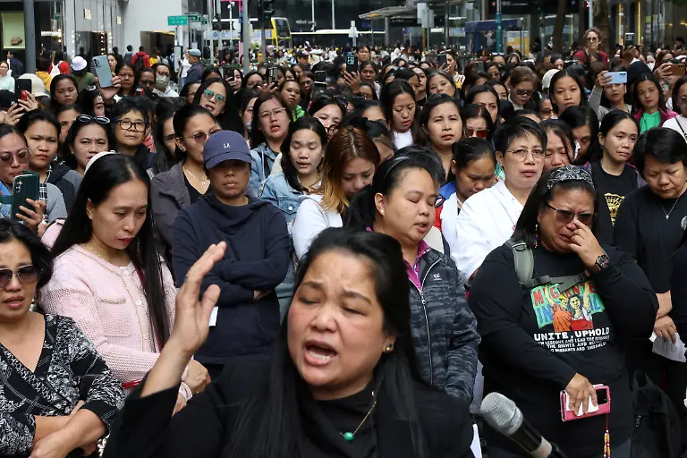 Mourners-attend-a-Filipino-community-prayer-meeting-for-victims-of-the-deadly-fire-that-occurred-on-Wednesday-at-the-Wang-Fuk-Court-housing-complex-in-Tai-Po-in-Hong-Kong-China-November-30-2025