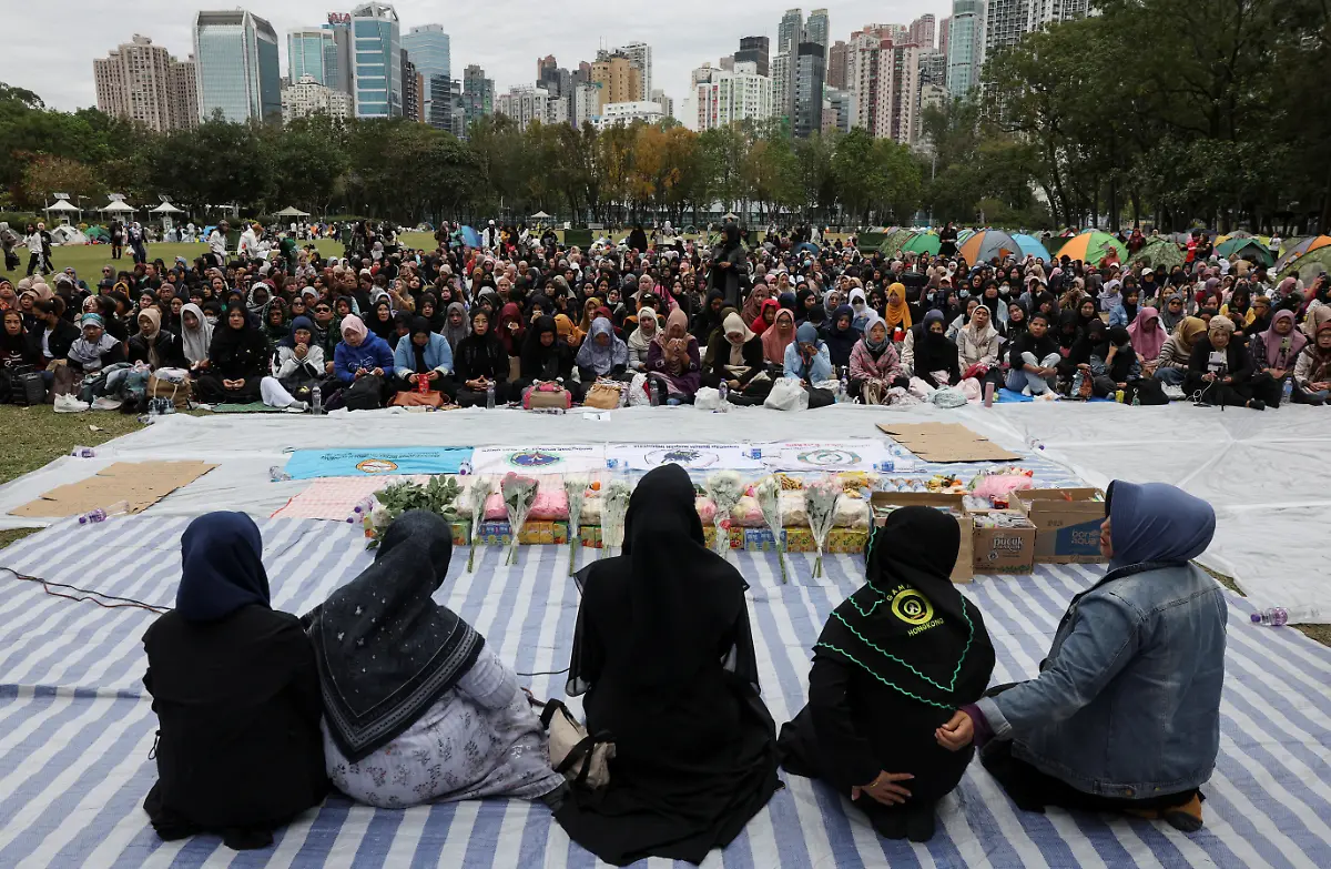 Mourners-attend-a-Muslim-prayer-gathering-organized-by-the-Indonesian-community-for-victims-of-the-deadly-fire-that-occurred-on-Wednesday-at-the-Wang-Fuk-Court-housing-complex-in-Tai-Po-in-Hong-Kong-China-November-30-2025