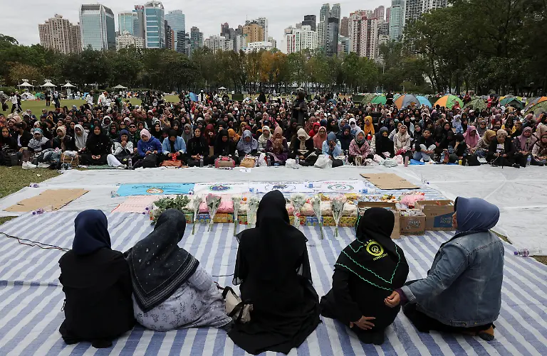 Mourners-attend-a-Muslim-prayer-gathering-organized-by-the-Indonesian-community-for-victims-of-the-deadly-fire-that-occurred-on-Wednesday-at-the-Wang-Fuk-Court-housing-complex-in-Tai-Po-in-Hong-Kong-China-November-30-2025