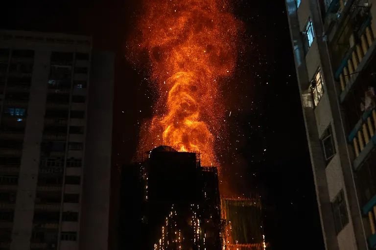 Flames-engulf-a-building-after-a-fire-broke-out-at-Wang-Fuk-Court-a-residential-estate-in-the-Tai-Po-district-of-Hong-Kong-s-New-Territories-Wednesday-Nov-26-2025