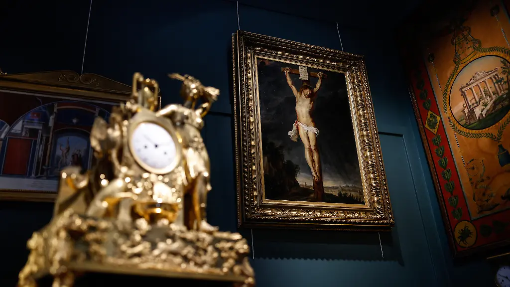 This-photograph-taken-on-September-11-2025-shows-the-painting-Christ-on-the-cross-by-Dutch-painter-Peter-Paul-Rubens-exhibited-at-the-Osenat-auction-house-in-Fontainebleau-south-of-Paris-A-long-lost-painting-by-17th-century-Flemish-master-Peter-Paul-Rubens-has-been-found-in-a-Paris-mansion-a-French-auctioneer-said-on-September-10-2025-It-is-a-masterpiece-said-Jean-Pierre-Osenat-who-had-made-the-discovery-referring-to-the-sketch-of-Jesus-Christ-on-the-cross-painted-in-1613-It-was-painted-by-Rubens-at-the-height-of-his-talent-he-told-AFP-adding-that-the-artwork-was-in-very-good-condition-Osenat-the-head-of-the-eponymous-auction-house-said-he-had-found-the-painting-in-September-2024-while-preparing-to-sell-the-private-mansion-in-the-French-capital-s-chic-6th-district