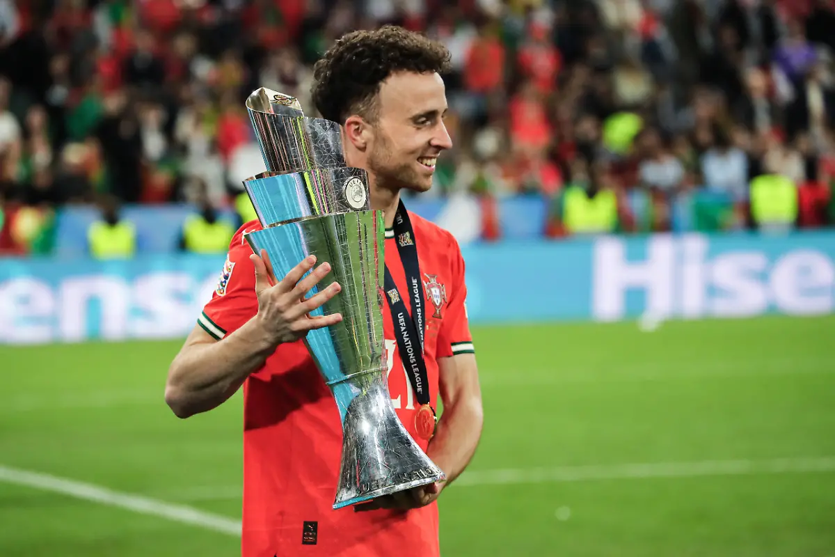 Diogo-JOTA-of-Portugal-celebrating-the-winning-trophy-after-the-victory-of-his-team-following-the-UEFA-Nations-League-2025-final-match-between-Portugal-and-Spain-at-the-Allianz-Arena-stadium-on-June-8-2025-in-Munich-Germany