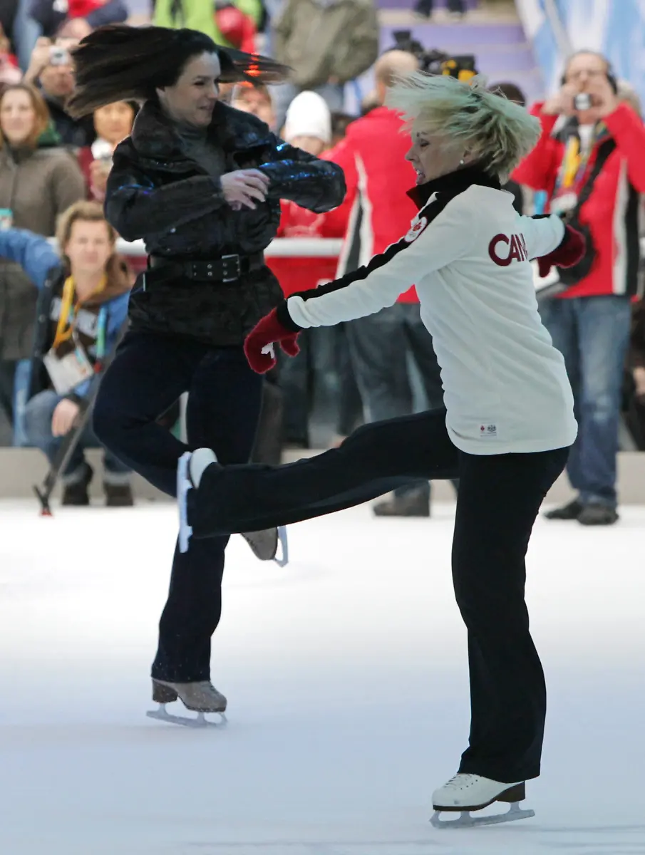 Vancouver-Olympics-Katarina-Witt-left-1988-Olympic-gold-medalist-in-figure-skating-skates-with-silver-medalist-Elizabeth-Manley-of-Canada-in-Vancouver-British-Columbia-Canada-Sunday-Feb-7-2010-The-pair-were-reunited-after-22-years-to-promote-the-Vancouver-Winter-Olympics-which-open-Feb-12