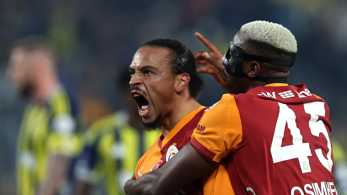 Soccer-Football-Super-Lig-Fenerbahce-v-Galatasaray-Sukru-Saracoglu-Stadium-Istanbul-Turkey-December-1-2025-Galatasaray-s-Leroy-Sane-celebrates-scoring-their-first-goal-with-Victor-Osimhen-REUTERS-Umit-Bektas
