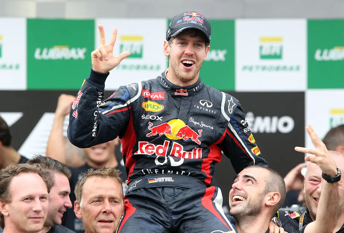 Red-Bull-driver-Sebastian-Vettel-celebrates-as-he-wins-his-third-Formula-1-title-at-the-end-of-the-Brazilian-F1-Grand-Prix-in-Interlagos-circuit-in-southern-Sao-Paulo-Brazil-on-Sunday-November-25-2012