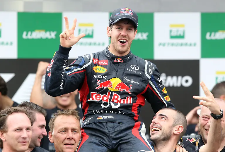 Red-Bull-driver-Sebastian-Vettel-celebrates-as-he-wins-his-third-Formula-1-title-at-the-end-of-the-Brazilian-F1-Grand-Prix-in-Interlagos-circuit-in-southern-Sao-Paulo-Brazil-on-Sunday-November-25-2012
