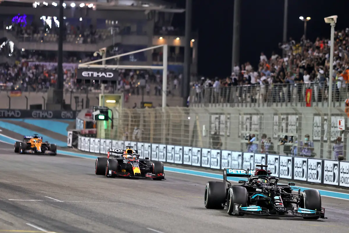 Christmas-Package-2021-File-photo-dated-12-12-2021-of-Mercedes-driver-Lewis-Hamilton-leading-Red-Bull-s-Max-Verstappen-Hamilton-was-undeterred-taking-the-lead-into-the-first-corner-and-keeping-it-despite-a-lunge-from-Verstappen-later-on-the-opening-lap-Issue-date-Thursday-December-16-2021-See-PA-story-AUTO-Christmas-F1-Photo-credit-should-read-PA-Wire-PA-Wire