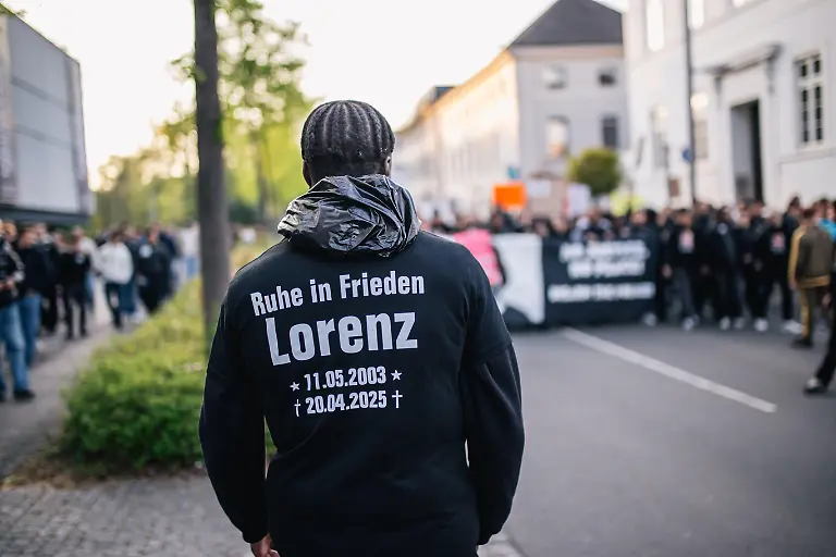 OLDENBURG-GERMANY-APRIL-25-People-gather-to-pay-tribute-to-a-21-year-old-black-man-named-Lorenz-A-who-was-killed-last-Sunday-by-German-police-on-April-25-2025-in-Oldenburg-Germany-Thousands-of-protesters-gathered-in-the-city-center-to-demand-justice-for-the-black-victim-who-was-shot-4-times-by-a-policeman-from-behind-after-he-allegedly-used-tear-gas