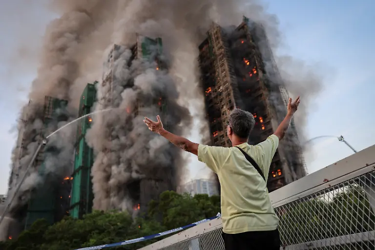 Wong-71-reacts-after-saying-his-wife-is-trapped-inside-Wang-Fuk-Court-during-a-major-fire-in-Tai-Po-Hong-Kong-China-November-26-2025-REUTERS-Tyrone-Siu-SEARCH-HONG-KONG-FIRE-PICTURE-FOR-THIS-STORY-SEARCH-WIDER-IMAGE-FOR-ALL-STORIES