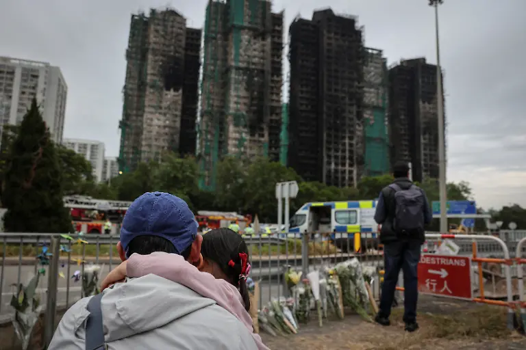 2025-12-02T230357Z_882972110_RC2W6IA9J2DW_RTRMADP_3_HONGKONG-FIRE-WONGFAMILY-PICTURE