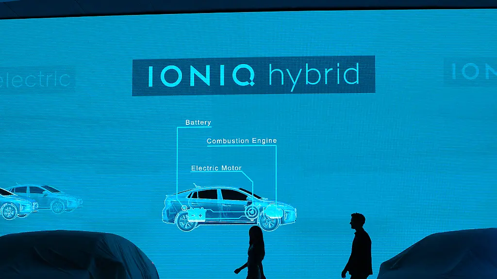 NEW-YORK-NY-MARCH-23-Employees-prepare-to-unveil-the-new-Hyundai-Ioniq-series-during-the-New-York-International-Auto-Show-at-the-Javits-Center-on-March-23-2016-in-New-York-NY-Hyundai-introduced-their-Ioniq-line-of-energy-efficient-cars-including-an-electric-a-hybrid-and-a-plug-in-hybrid-model