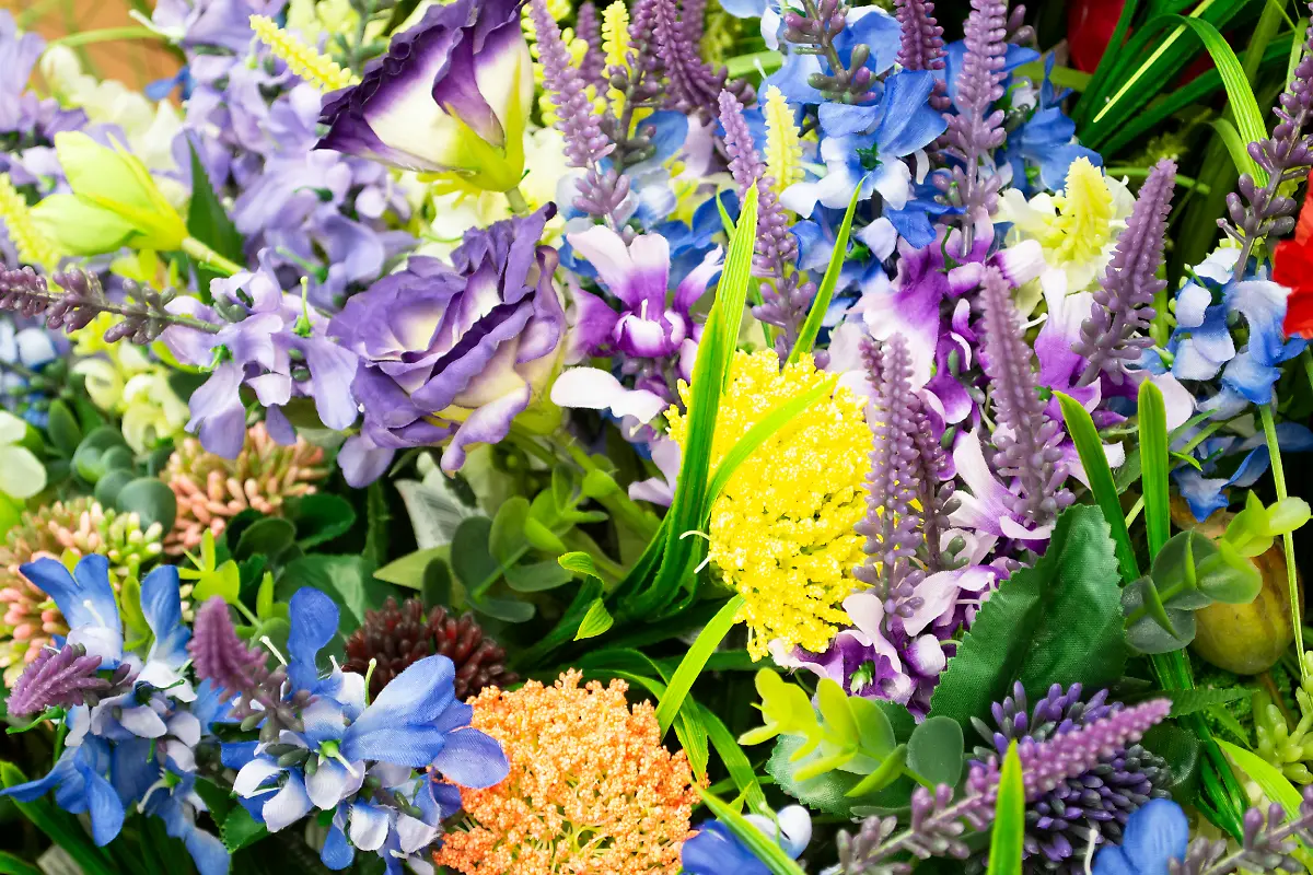 blue-artificial-flowers-mixed-bouquet-for-background-blue-artificial-flowers-mixed-bouquet-for-background-close-up-blue-artificial-flowers-mixed-bouquet-for-background-close-up-14-03-2021-Copyright-xannaolgabymonacox-Panthermedia29702118