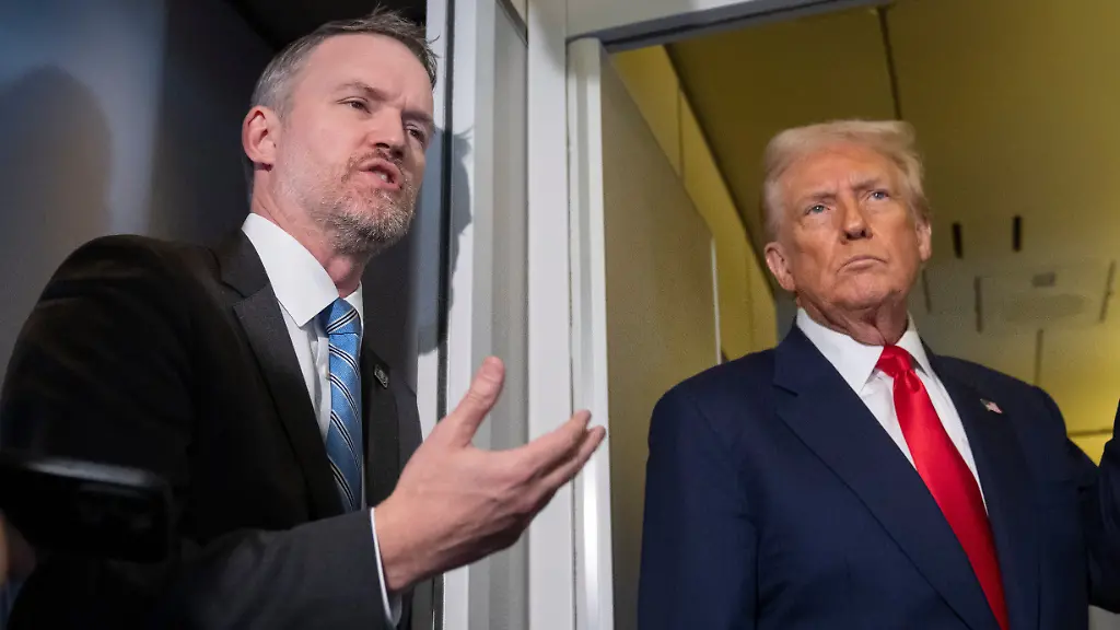 U-S-Trade-Representative-Jamieson-Greer-left-speaks-with-reporters-aboard-Air-Force-One-as-President-Donald-Trump-listens-shortly-after-taking-off-from-Busan-South-Korea-en-route-to-Joint-Base-Andrews-Md-Thursday-Oct-30-2025