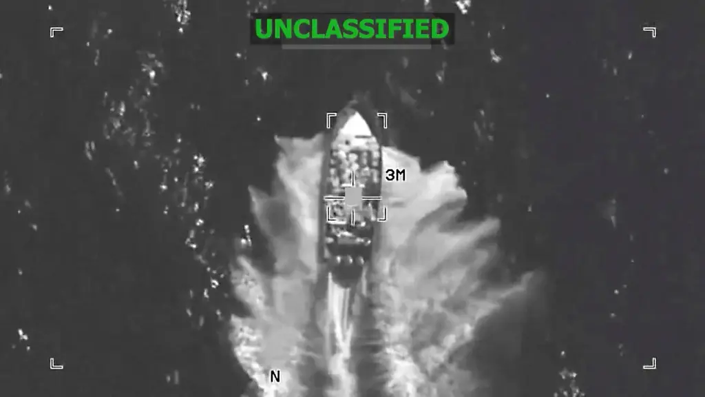 A-U-S-military-strike-on-what-they-said-was-a-suspected-drug-vessel-in-international-waters-at-a-location-given-as-the-Eastern-Pacific-in-the-screen-grab-from-handout-video-released-December-4-2025-U-S-Southern-Command-Handout-via-REUTERS-THIS-IMAGE-HAS-BEEN-SUPPLIED-BY-A-THIRD-PARTY-OVERLAY-AND-WATERMARK-FROM-SOURCE-VERIFICATION-LINES-Reuters-was-not-able-to-independently-verify-the-location-or-the-date-when-the-video-was-filmed-Upon-checking-this-footage-no-old-results-were-found