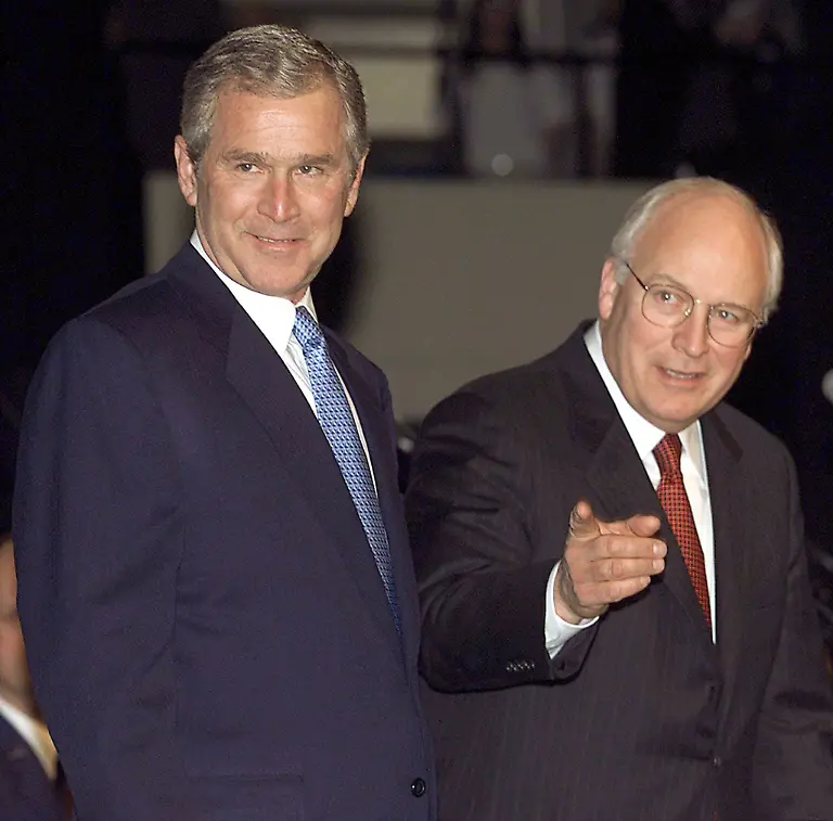 US-President-elect-George-W-Bush-L-and-Vice-President-elect-Dick-Cheney-attend-the-Vice-President-s-Salute-to-America-s-Veterans-at-George-Washington-University-in-Washington-DC-19-January-2001-Bush-will-be-sworn-in-as-president-20-January-2001