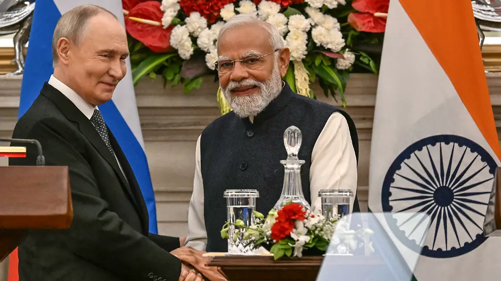 Russia-s-President-Vladimir-Putin-L-speaks-with-India-s-Prime-Minister-Narendra-Modi-after-their-joint-press-statements-at-the-Hyderabad-House-in-New-Delhi-on-December-5-2025-India-s-Prime-Minister-Narendra-Modi-hosted-Russia-s-President-Vladimir-Putin-on-December-5-with-defence-and-trade-ties-centre-stage-as-New-Delhi-faces-heavy-US-pressure-to-stop-buying-Moscow-s-oil