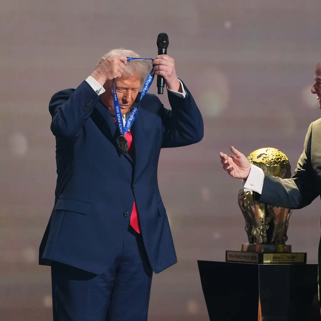 FIFA-President-Gianni-Infantino-presents-President-Donald-Trump-with-the-FIFA-Peace-Prize-during-the-draw-for-the-2026-soccer-World-Cup-at-the-Kennedy-Center-in-Washington-Friday-Dec-5-2025
