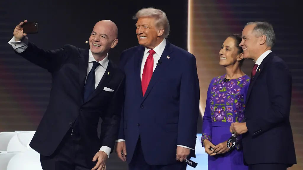 From-l-r-FIFA-President-Gianni-Infantino-takes-a-selfie-with-President-Donald-Trump-Mexican-President-Claudia-Sheinbaum-and-Canadian-Prime-Minister-Mark-Carney-during-the-draw-for-the-2026-soccer-World-Cup-at-the-Kennedy-Center-in-Washington-Friday-Dec-5-2025