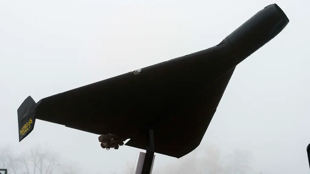 November-23-2025-Kyiv-Kyiv-City-Ukraine-A-Shahed-type-drone-a-Russian-made-Geran-2-is-displayed-along-destroyed-Russian-tanks-and-equipment-and-destroyed-Ukrainian-civilian-vehicles-displayed-on-Mykhailivska-square-in-Kyiv-Shahed-type-drones-enter-Ukrainian-airspace-almost-every-single-night-often-hundreds-of-them-at-once