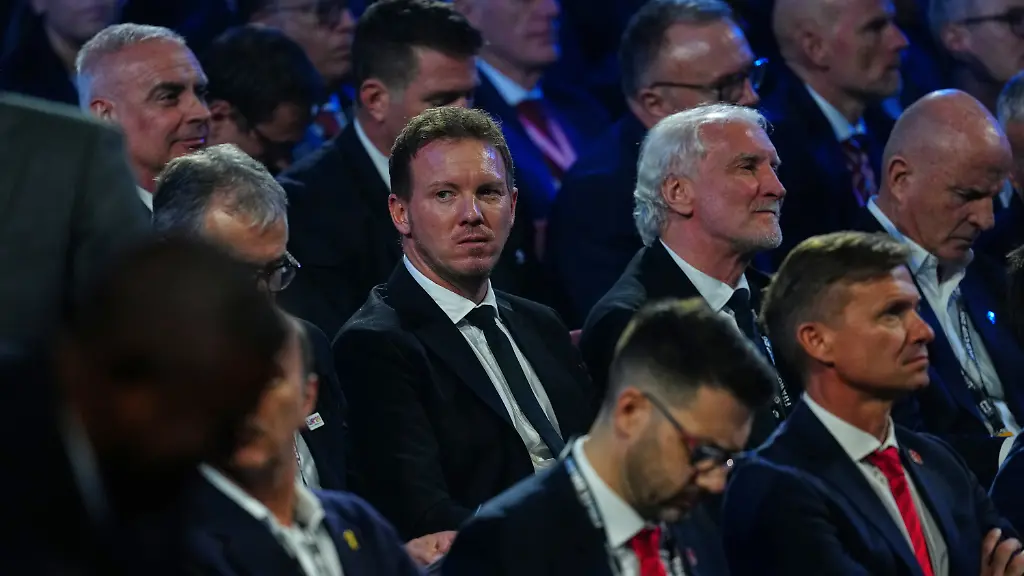 Germany-s-coach-Julian-Nagelsmann-center-sits-in-the-crowd-during-the-draw-for-the-2026-soccer-World-Cup-at-the-Kennedy-Center-in-Washington-Friday-Dec-5-2025